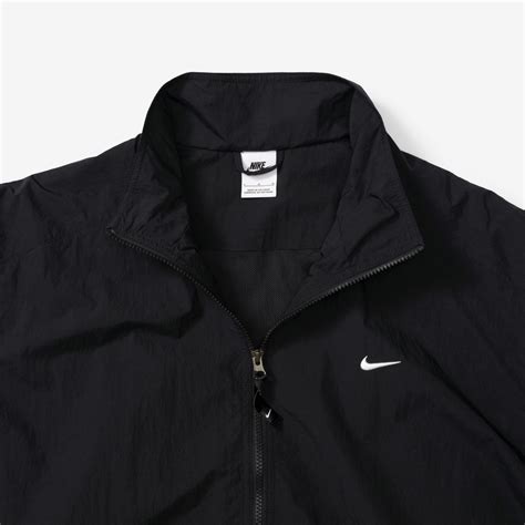 nike solo swoosh track jacket